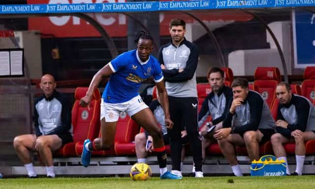 Joe Aribo in full flow for Rangers in their opening pre-season friendly against Partick Thistle at Firhill as manager Steven Gerrard looks on. (Photo by Craig Williamson / SNS Group)