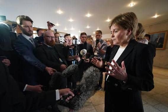 Former first minister Nicola Sturgeon talking to the media as she returned to the Scottish Parliament. Picture: Andrew Milligan/PA Wire
