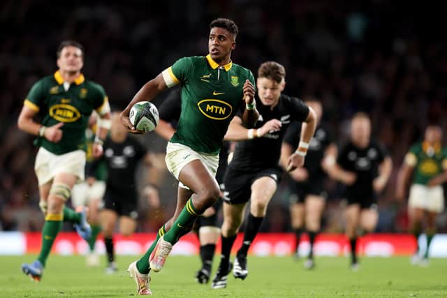 Canan Moodie of South Africa on the attack against New Zealand at Twickenham. South Africa won 35-7. (Photo by Julian Finney/Getty Images)