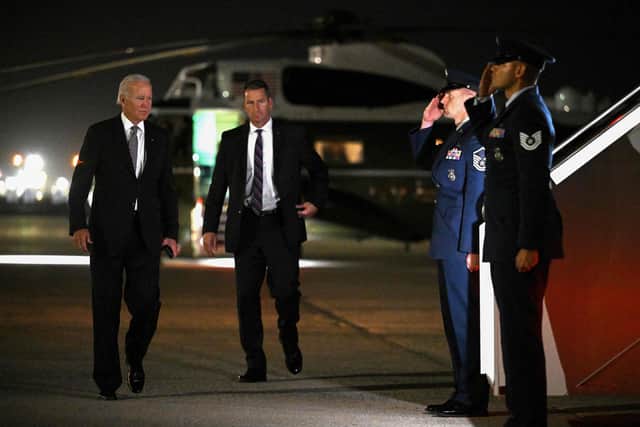 US President Joe Biden walks to boards Air Force One before departing from John F. Kennedy International Airport in New York on October 6, 2022. (Photo by MANDEL NGAN via Getty Images
