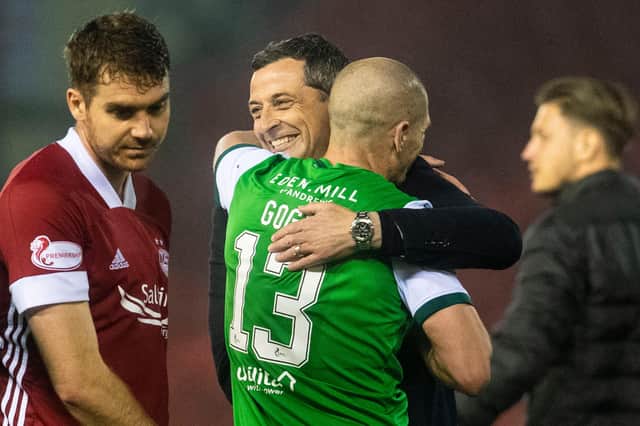 Jack Ross embraces Alex Gogic at full time after Hibs defeated Aberdeen 1-0.