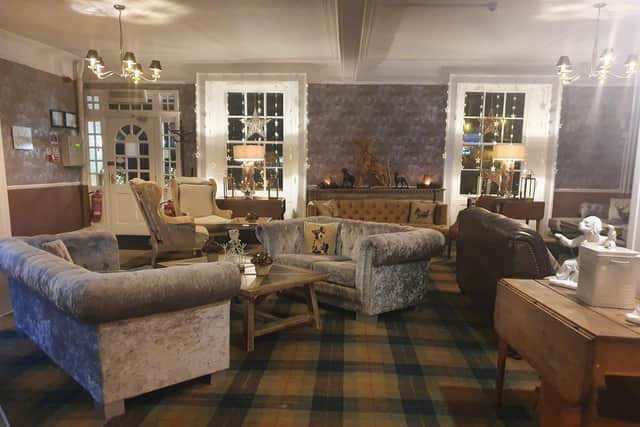 Comfy armchairs and squishy sofas lend a homey atmosphere to the hotel. Photo: Rachael Davies.