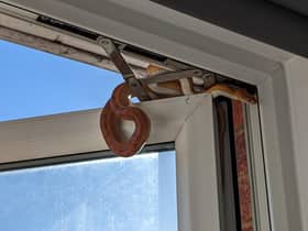 A corn snake on the window frame of a home in Hereford Walk, Basildon