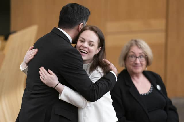 Humza Yousaf hugs Kate Forbes in the main chamber during the vote for the new First Minister at the Scottish Parliament in Edinburgh.