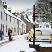 Members of the public walk through the snow on February 9, 2020 in Falkland, Fife. Photo by Jeff J Mitchell/Getty Images
