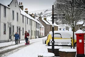 Members of the public walk through the snow on February 9, 2020 in Falkland, Fife. Photo by Jeff J Mitchell/Getty Images