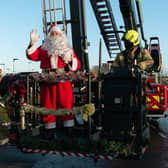 Firefighters used a high reach appliance to lift Santa up to the windows to wave to children after the pandemic scuppered a traditional visit at the Royal Aberdeen Children's Hospital.