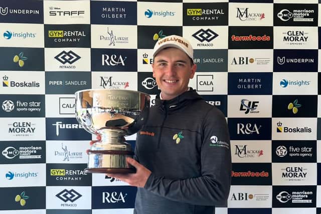 Sam Locke shows off the trophy after making an eagle at the last hole to win the Portlethen Classic presented by Entier. Picture: Tartan Pro Tour