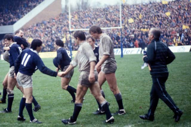 Scotland wing Roger Baird (11) exchanges handshakes with an England opponent after the final whistle of an 18-6 home victory at Murrayfield in 1984.