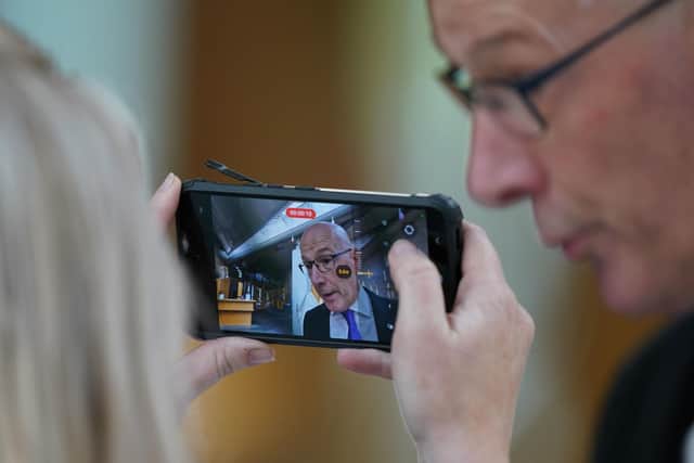 John Swinney speaking to the media at the Scottish Parliament in Edinburgh, after he became the first candidate to declare his bid to become the new leader of the SNP. Picture: Andrew Milligan/PA Wire