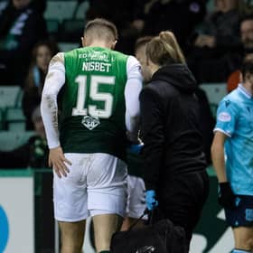 Hibs striker Kevin Nisbet is an injury doubt for the Premier Sports Cup final against Celtic after limping off during the 1-0 win over Dundee.  (Photo by Ross Parker / SNS Group)