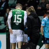Hibs striker Kevin Nisbet is an injury doubt for the Premier Sports Cup final against Celtic after limping off during the 1-0 win over Dundee.  (Photo by Ross Parker / SNS Group)