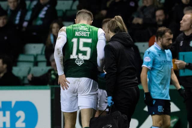 Hibs striker Kevin Nisbet is an injury doubt for the Premier Sports Cup final against Celtic after limping off during the 1-0 win over Dundee.  (Photo by Ross Parker / SNS Group)