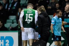 Hibs striker Kevin Nisbet is an injury doubt for the Premier Sports Cup final against Celtic after limping off during the 1-0 win over Dundee.  (Photo by Ross Parker / SNS Group)