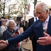 Britain's King Charles III speaks with well-wishers on The Mall near to Buckingham Palace in central London. Picture: Marco Bertorello/AFP via Getty Images