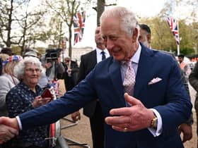Britain's King Charles III speaks with well-wishers on The Mall near to Buckingham Palace in central London. Picture: Marco Bertorello/AFP via Getty Images