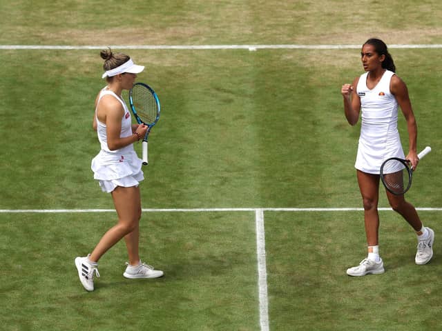 Maia Lumsden, left, and Naiktha Bains celebrate against Viktoria Hruncakova and Tereza Mihalikova during their latest Wimbledon women's doubles scalp.