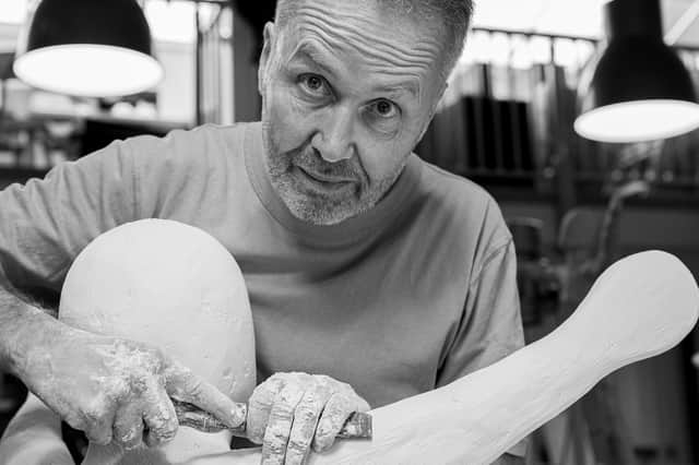Steuart Padwick working on The Child of Hope model in his London studio (Picture: James Rudoni)