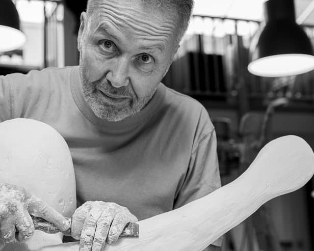 Steuart Padwick working on The Child of Hope model in his London studio (Picture: James Rudoni)