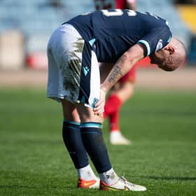 Dundee midfielder Charlie Adam was booked for simulation.