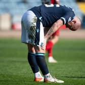 Dundee midfielder Charlie Adam was booked for simulation.