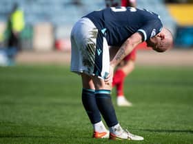 Dundee midfielder Charlie Adam was booked for simulation.