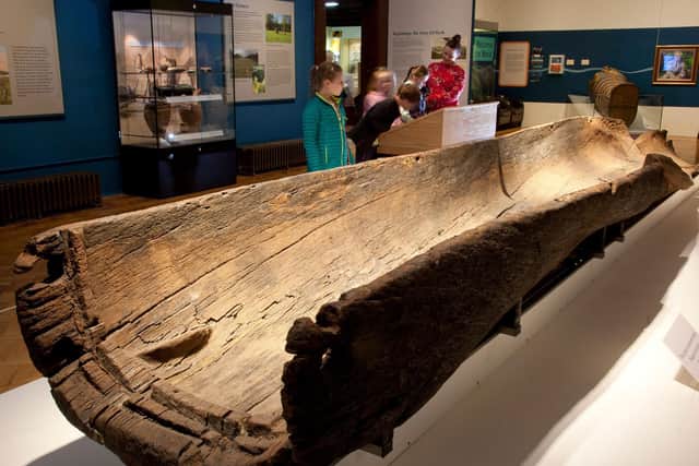 The stunning Carpow Log boat was carved from a single tree trunk around 3,000 years ago and illuminates everyday life - and ceremonial life - in the Bronze Age age on the River Tay . PIC: Perth Museum.