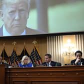 Former US president Donald Trump is seen on a screen during the House select committee hearing. Picture: Brendan Smialowski/AFP/Getty