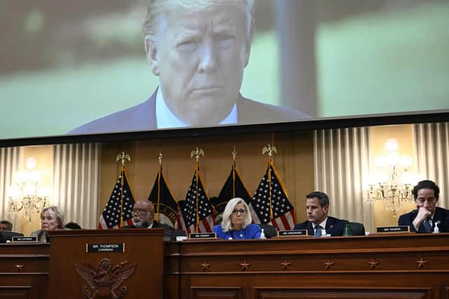 Former US president Donald Trump is seen on a screen during the House select committee hearing. Picture: Brendan Smialowski/AFP/Getty