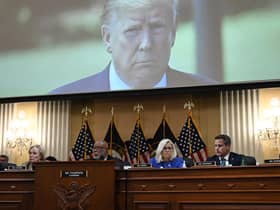 Former US president Donald Trump is seen on a screen during the House select committee hearing. Picture: Brendan Smialowski/AFP/Getty