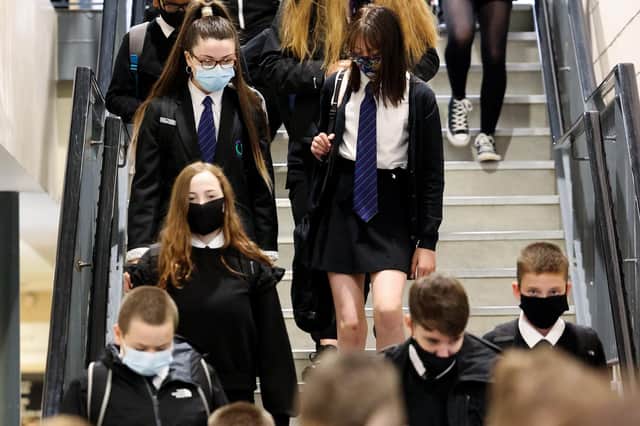 Pupils at Rosshall Academy wear face coverings