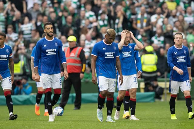 The dejected Rangers players trudge off after a galling afternoon in the east end of Glasgow.