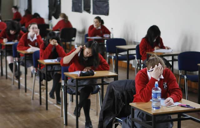 School students will sit normal exams this year as the danger posed by Covid subsides (Picture: Niall Carson/PA)
