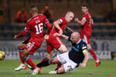 Dundee skipper Charlie Adam (right) tackles opposite number Scott Brown during the Dens Park side's 2-1 win over Aberdeen on Saturday night (Photo by Alan Harvey / SNS Group)