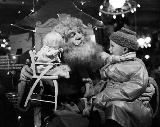 Santa Claus with little boy in Jenners - Edinburgh 1954