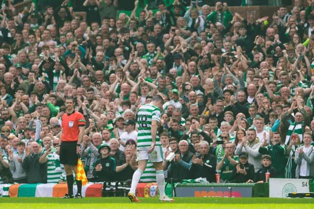 Celtic's Tom Rogic leaves the pitch in his final game against Motherwell.