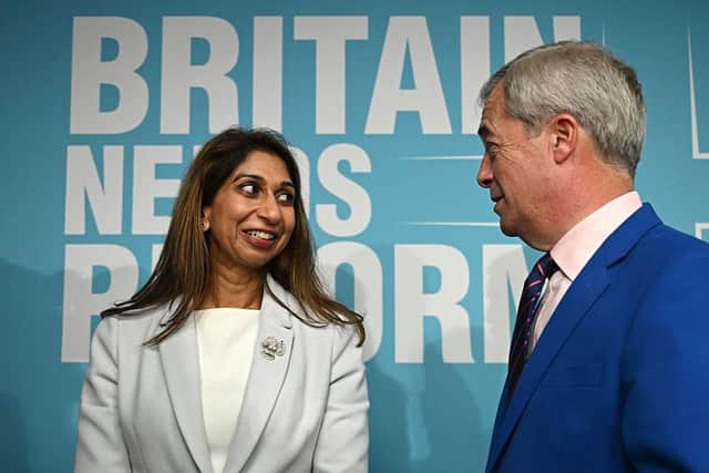 Former Conservative Home Secretary Suella Braverman speaks with leader Nigel Farage during a press conference about her defection to Reform UK on Monday (Picture: Leon Neal/Getty Images)
