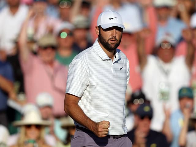 Scottie Scheffler  reacts after making birdie on the 18th green during the third round of the 2024 Masters Tournament at Augusta National Golf Club. Picture: Warren Little/Getty Images.