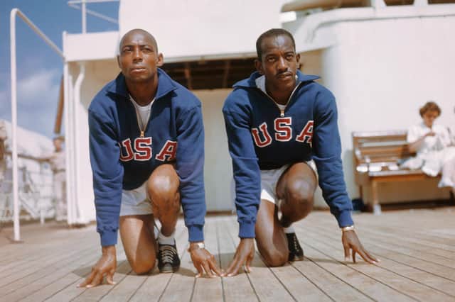 Barney Ewell, left, with fellow sprinter Harrison Dillard en route to the 1948 Olympic Games in London. Picture: Bettmann Archive/Getty Images