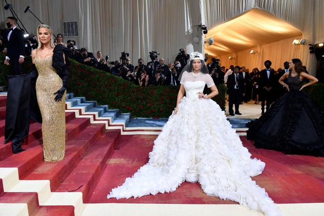 US socialite Kylie Jenner (R) and US socialite US socialite Khloe Kardashian arrive for the 2022 Met Gala at the Metropolitan Museum of Art on May 2, 2022, in New York. Photo by ANGELA  WEISS/AFP via Getty Images