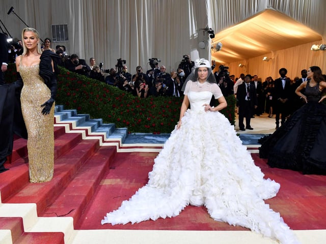 US socialite Kylie Jenner (R) and US socialite US socialite Khloe Kardashian arrive for the 2022 Met Gala at the Metropolitan Museum of Art on May 2, 2022, in New York. Photo by ANGELA  WEISS/AFP via Getty Images