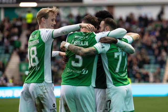 Hibs players celebrate after Martin Boyle's opening goal.