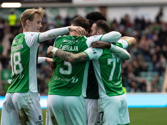 Hibs players celebrate after Martin Boyle's opening goal.