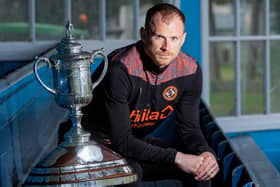 Time is running out for Dundee United skipper Mark Reynolds to create some happier Hampden memories  (Photo by Mark Scates / SNS Group)