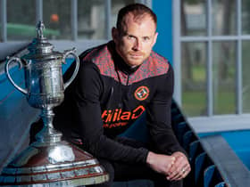 Time is running out for Dundee United skipper Mark Reynolds to create some happier Hampden memories  (Photo by Mark Scates / SNS Group)