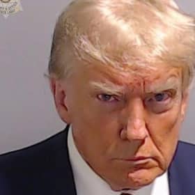 Donald Trump pictured looking really very cross about something (Picture: Fulton County Sheriff's Office via Getty Images)