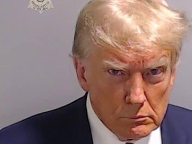 Donald Trump pictured looking really very cross about something (Picture: Fulton County Sheriff's Office via Getty Images)