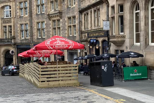 Temporary structures appeared outside hospitality businesses in Edinburgh city centre, including the Scotsman Lounge on Cockburn Street, earlier this year. Picture: Matt Donlan