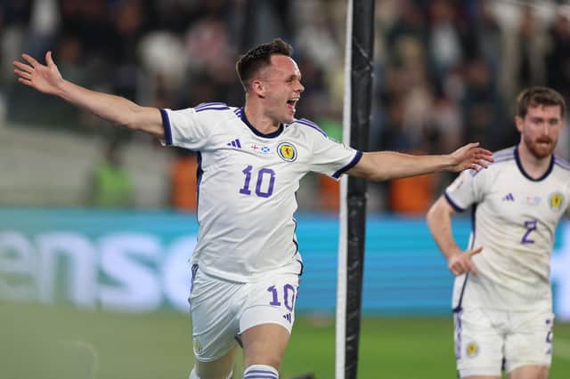 Lawrence Shankland celebrates after scoring Scotland's injury-time equaliser in Georgia. (Photo by GIORGI ARJEVANIDZE/AFP via Getty Images)