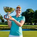 Kylie Henry shows off the trophy after her two-shot victory in the Dimension Data Pro-Am at Fancourt.